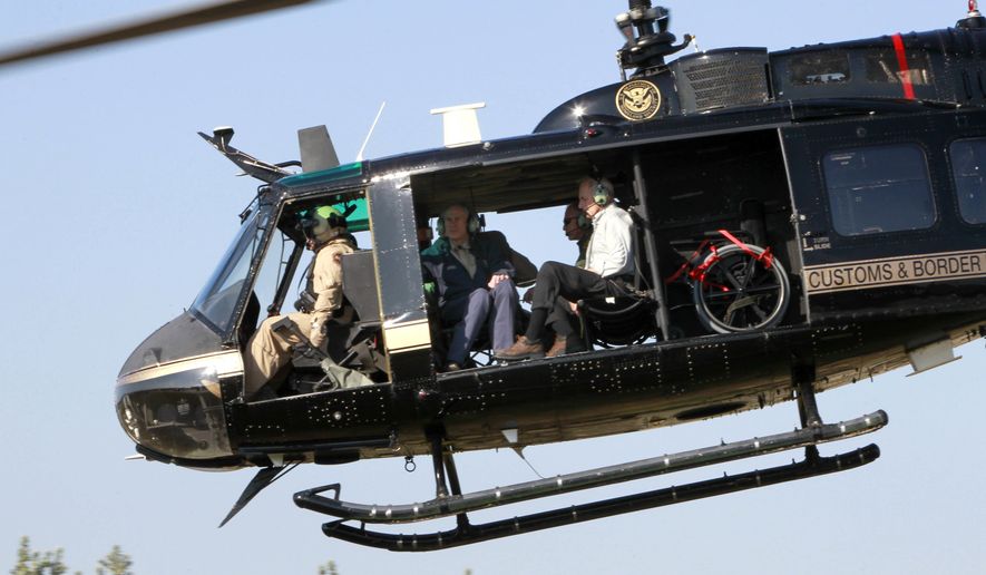 Secretary of Homeland Security John Kelly and Texas Governor Greg Abbott take off in a helicopter tour of the Texas border with Mexico Wednesday, Feb. 1, 2017 at the Texas Department of Public Safety regional headquarters in Weslaco, Texas. (Nathan Lambrecht/The Monitor via AP, Pool)
