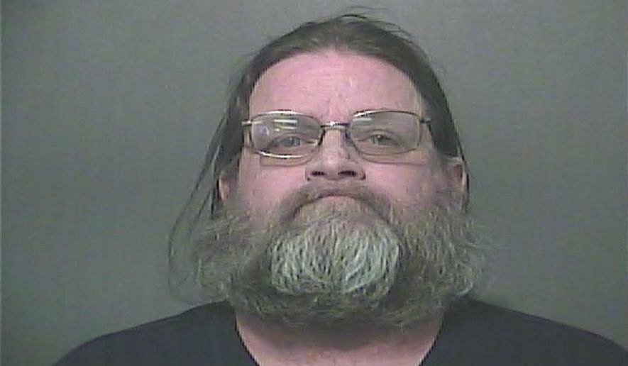 This photo provided by the Vigo County Sheriffs Department shows Hubert A Kraemer, 56, one of four people charged with neglect in the death of a malnourished 9-year-old Indiana boy with cerebral palsy. Cameron R. Hoopingarner was blind and weighed less than 15 pounds when officers found him Tuesday, Feb. 21, at a home near Fontanet, Ind., 60 miles west of Indianapolis, Vigo County Sheriff Greg Ewing said. The officers were responding to a call about a child in cardiac arrest. Cameron was pronounced dead at a hospital. (Vigo County Sheriffs Department via AP)