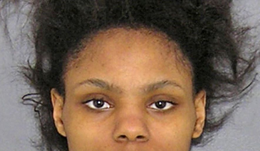 FILE – This undated file photo provided by the Hamilton County, Ohio, Sheriff's Office shows Deasia Watkins, who pleaded guilty to murder Thursday, Feb. 23, 2017, in the stabbing and decapitation of her 3-month-old daughter Jayniah Watkins in March 2015. Hamilton County Common Pleas Judge Charles J. Kubicki Jr. sentenced Watkins to 15 years to life in prison. (Hamilton County Sheriff's Office via AP, File)