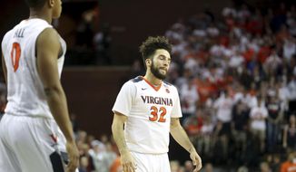 Virginia guard London Perrantes (32) reacts during overtime an NCAA college basketball game against Miami, Monday, Feb. 20, 2017, in Charlottesville, Va. Miami defeated Virginia 54-48. (AP Photo/Ryan M. Kelly) **FILE**