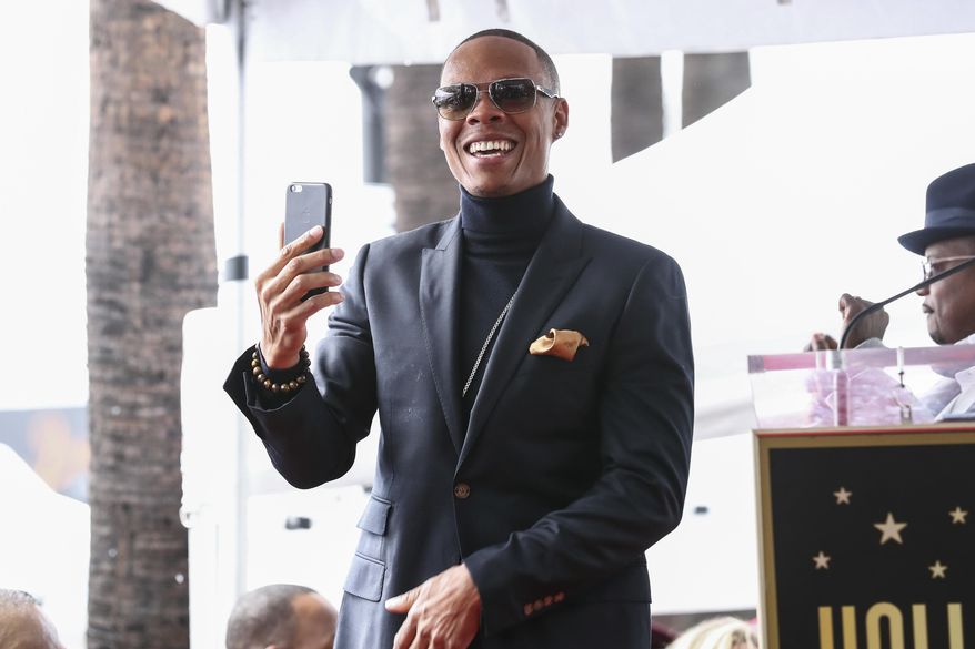 FILE - In this Jan. 23, 2017, file photo, Ronnie DeVoe attends a ceremony honoring New Edition with a star on the Hollywood Walk of Fame in Los Angeles. DeVoe announced that his wife is pregnant through an Instagram post on Feb. 22, 2017. (Photo by John Salangsang/Invision/AP, File)