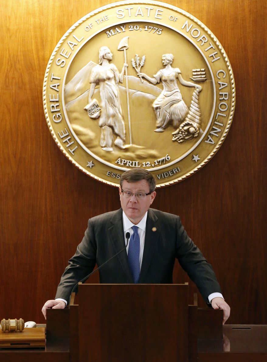 FILE - In this Wednesday, Dec. 21, 2016 file photo, North Carolina Speaker of the House Tim Moore speaks as the North Carolina General Assembly convenes for a special session in Raleigh, N.C., to see if enough lawmakers are willing to repeal a 9-month-old law that limited LGBT rights, including which bathrooms transgender people can use in public schools and government buildings. (Chris Seward /The News & Observer via AP)