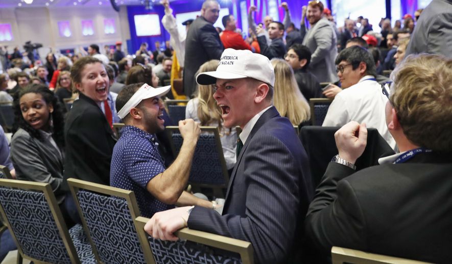 Supporters shout down a protester as President Donald Trump speaks at the Conservative Political Action Conference (CPAC), Friday, Feb. 24, 2017, in Oxon Hill, Md. (AP Photo/Alex Brandon)