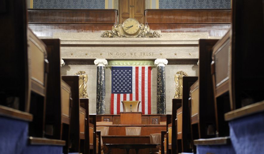 This Dec. 8, 2008, file photo shows the House Chamber on Capitol Hill in Washington. A presidential speech to Congress is one of those all-American moments that ooze ritual and decorum. The House sergeant-at-arms will stand at the rear of the House of Representatives on Tuesday night and announce the arrival of Donald Trump before a joint session of Congress by intoning: “Mister Speaker, the President of the United States” just like always. (AP Photo/Susan Walsh, File)