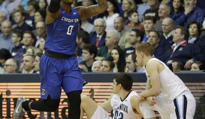 Creighton&#x27;s Marcus Foster, left, reacts after making a three-pointer during the first half of an NCAA college basketball game against Villanova, Saturday, Feb. 25, 2017, in Villanova, Pa. (AP Photo/Matt Slocum)