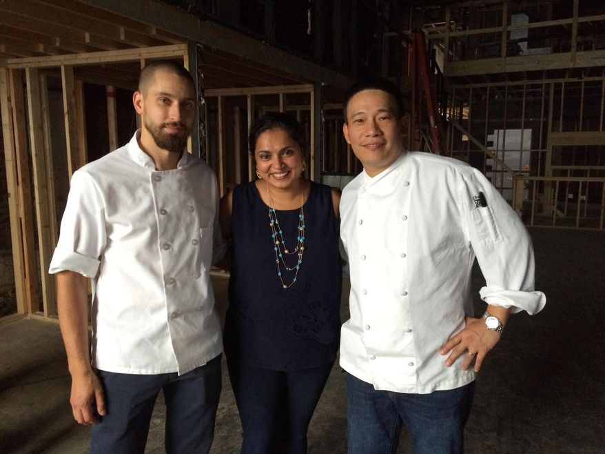 Alex Sidorov, left, Maneet Chauhan and Chris Cheung, here Feb. 22, 2017, are the culinary team behind Tansuo, a new Asian-inspired restaurant opening in the Gulch in the fall in Nashville, Tenn. For the now-entrenched and beloved celebrity chef Chauhan, whose community involvement has earned her wide praise, her next venture after Chauhan's Ale & Masala House is in the space right next door. Called Tànsuŏ, it will be Chauhan's inspired take on authentic Chinese food, a void she immediately noticed in Nashville. If that weren't enough, a third concept, The Mockingbird, will follow right next door to Tànsuŏ later in the spring. (Jim Myers/The Tennessean via AP)