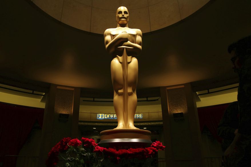 FILE - This Feb. 21, 2015 file photo shows an Oscar statue as preparations are made for the 87th Academy Awards in Los Angeles. The 89th Academy Awards will be held on Sunday. (Photo by Matt Sayles/Invision/AP, File)