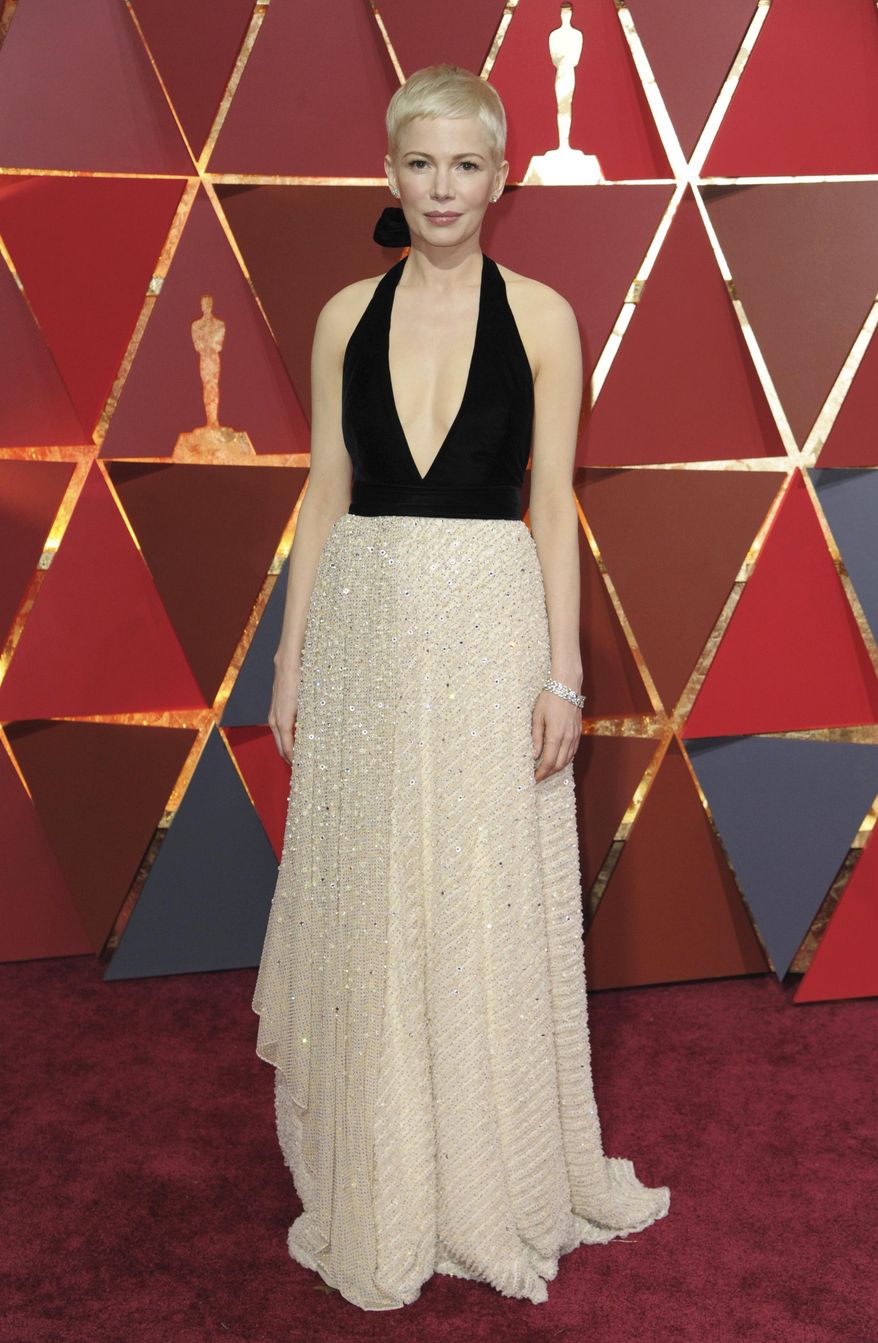 Michelle Williams arrives at the Oscars on Sunday, Feb. 26, 2017, at the Dolby Theatre in Los Angeles. (Photo by Richard Shotwell/Invision/AP)