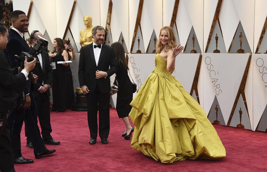 Judd Apatow, left, and Leslie Mann arrive at the Oscars on Sunday, Feb. 26, 2017, at the Dolby Theatre in Los Angeles. (Photo by Jordan Strauss/Invision/AP)