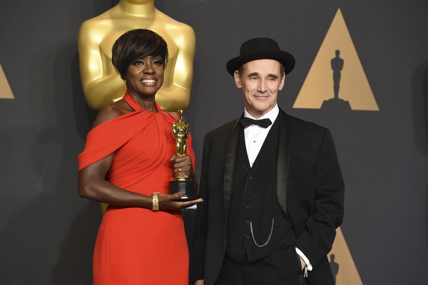 Viola Davis, left, and Mark Rylance pose in the press room at the Oscars on Sunday, Feb. 26, 2017, at the Dolby Theatre in Los Angeles. (Photo by Jordan Strauss/Invision/AP)