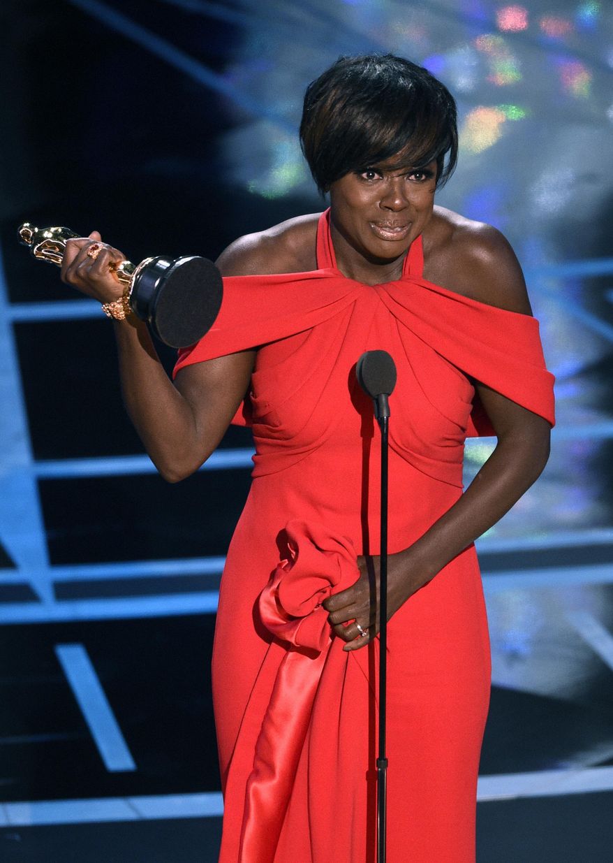 Viola Davis accepts the award for best actress in a supporting role for "Fences" at the Oscars on Sunday, Feb. 26, 2017, at the Dolby Theatre in Los Angeles. (Photo by Chris Pizzello/Invision/AP)