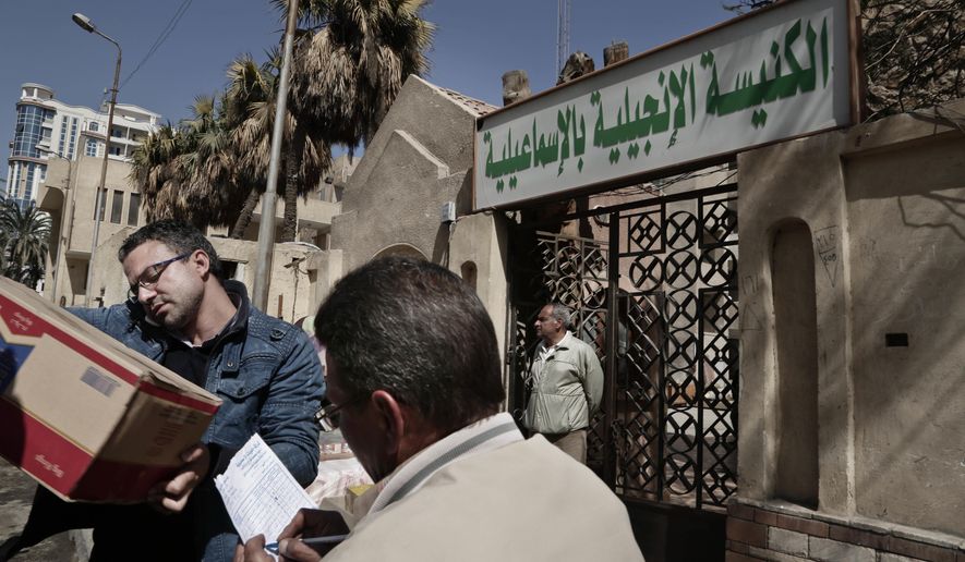A truck loaded with goods arrives for Christian families who fled el-Arish at the Evangelical Church in Ismailia, 120 kilometers (75 miles) east of Cairo, Egypt, Sunday, Feb. 26, 2017. Egyptian Christians fearing attacks by Islamic State militants are fleeing the volatile northern part of the Sinai Peninsula for a fourth day, after a string of sectarian killings there sent hundreds fleeing and raised accusations the government is failing to protect the minority. (AP Photo/Nariman El-Mofty)