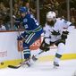sharks_canucks_hockey_97648.jpg