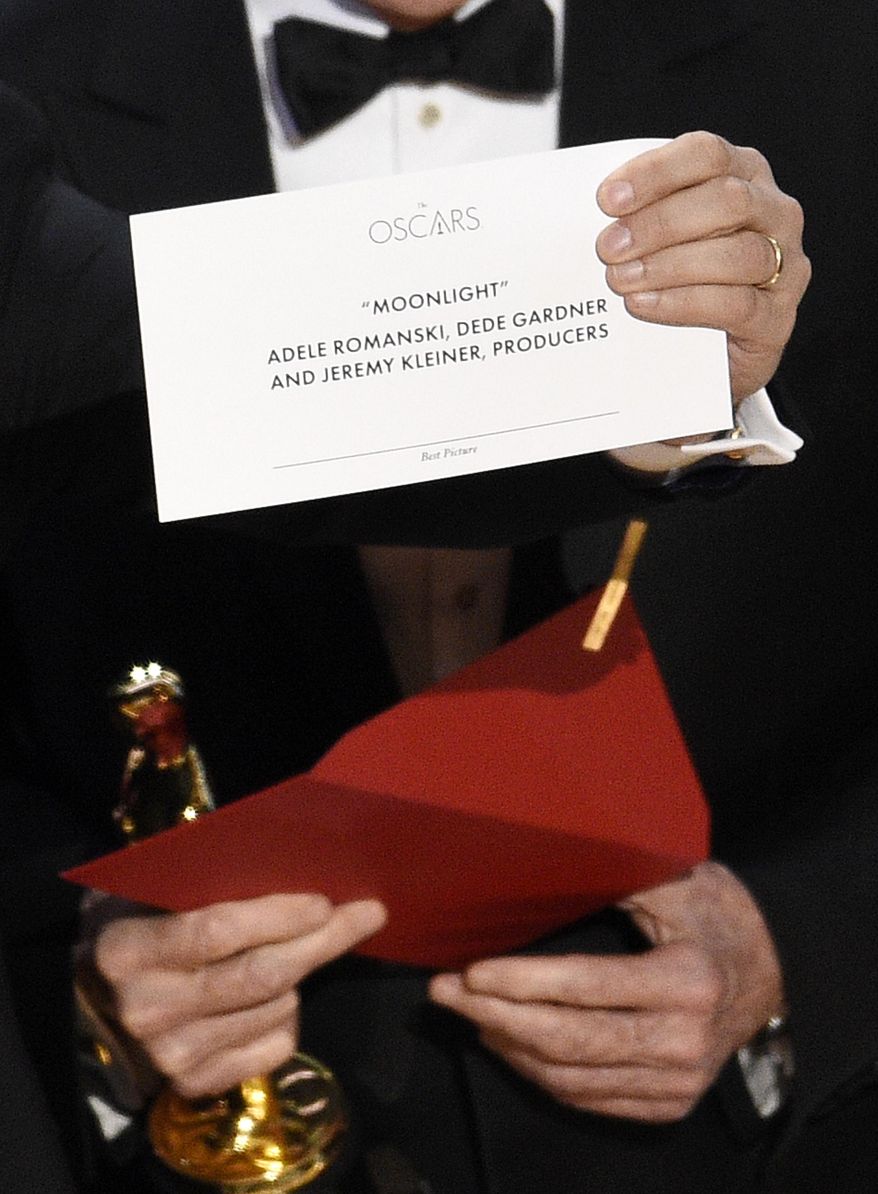 The envelope revealing "Moonlight" as the true winner of best picture is held up by "La La Land" producer Jordan Horowitz at the Oscars on Sunday, Feb. 26, 2017, at the Dolby Theatre in Los Angeles. (Photo by Chris Pizzello/Invision/AP)