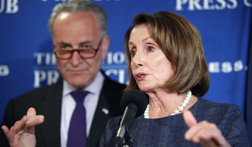House Minority Leader Nancy Pelosi of Calif., accompanied by Senate Minority Leader Chuck Schumer of N.Y., answers a reporter&#39;s question during a news conference at the National Press Club in Washington, Monday, Feb. 27, 2017. (AP Photo/Alex Brandon)