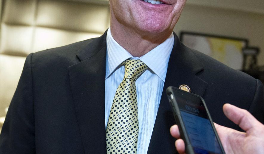 FILE - In this Feb. 25, 2017, file photo, Arkansas Gov. Asa Hutchinson speaks with a reporter in Washington. On Monday, Feb. 27, 2017, Hutchinson scheduled execution dates for eight inmates in an attempt to resume the death penalty after a nearly 12-year hiatus, even though the state lacks one of three drugs needed to put the men to death. (AP Photo/Cliff Owen, File)