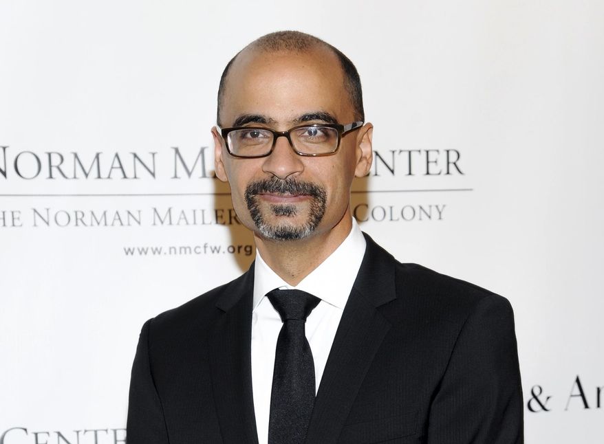FILE - This Oct. 17, 2013, file photo shows Mailer Prize for Distinguished Writing recipient Junot Diaz at the 5th annual Norman Mailer Center benefit gala in New York. Authors Ursula K. Le Guin, Junot Diaz and Ann Patchett are among this year's 14 inductees into the American Academy of Arts and Letters, the academy told The Associated Press on Monday, Feb. 27, 2017. (Photo by Evan Agostini/Invision/AP, File)