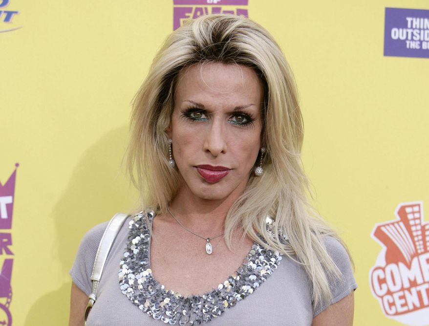 FILE - In this July 22, 2007 file photo, Alexis Arquette arrives at the "Comedy Central Roast of Flavor Flav" in Burbank, Calif. Actress Patricia Arquette says she was upset that the Oscars left her transgender sister out of the “In Memoriam” tribute during the awards show on Sunday, Feb. 26, 2017. Arquette told ABC News that she thought the Academy Awards “would have a little bit more respect” for the transgender community. (AP Photo/Matt Sayles, File)