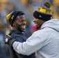 steelers-bell_brown_football_28881.jpg