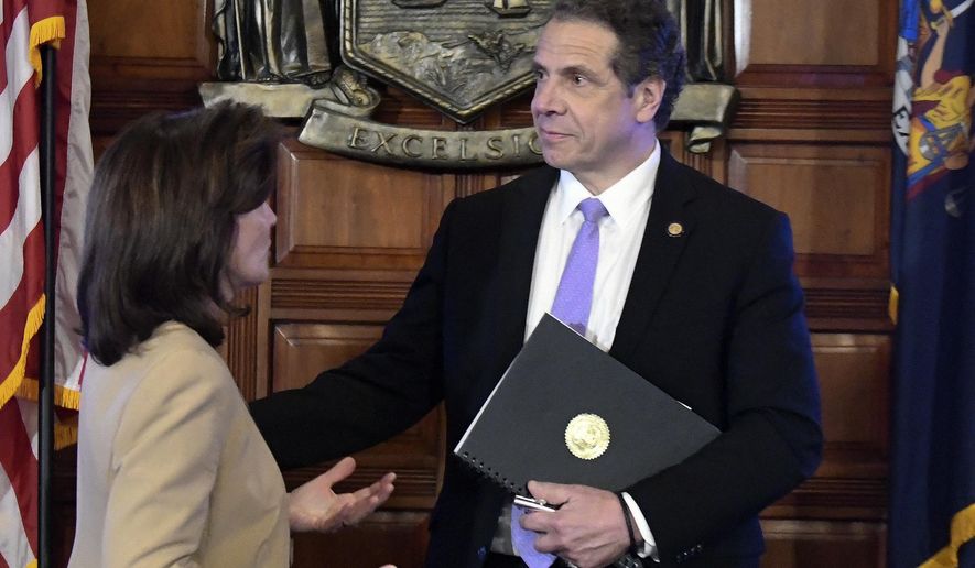 New York Lt. Gov. Kathy Hochul, left, speaks with Gov. Andrew Cuomo after a cabinet meeting in the Red Room at the Capitol on Tuesday, Feb. 28, 2017 in Albany, N.Y. (AP Photo/Hans Pennink)