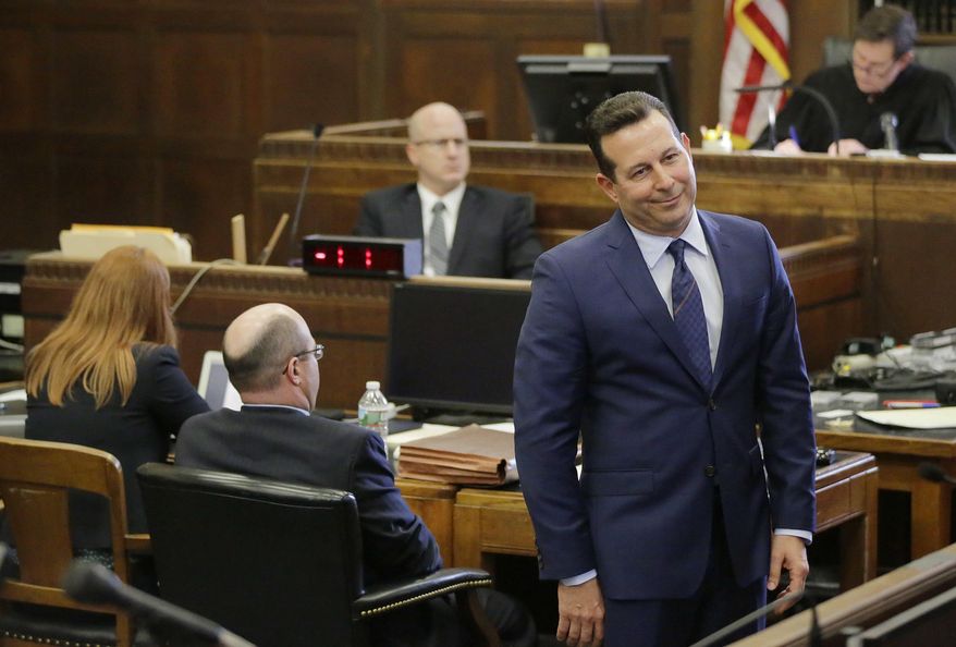 Lead defense attorney Jose Baez reacts as he delivers his opening statement to the jury on the first day of former New England Patriots tight end Aaron Hernandez's double murder trial at Suffolk Superior Court, Wednesday, March 1, 2017, in Boston. Hernandez is standing trial for the July 2012 killings of Daniel de Abreu and Safiro Furtado, who he encountered in a Boston nightclub. He is already serving a life sentence in the 2013 killing of semi-professional football player Odin Lloyd. (AP Photo/Stephan Savoia, Pool)