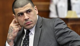 FILE- In this Dec. 27, 2016, file photo, former New England Patriots player Aaron Hernandez appears in Suffolk Superior Court for a pretrial hearing before Judge Jeffrey Locke in Boston. Opening statements are scheduled for Wednesday, March 1, 2017, in the double murder trial of ex-NFL star Hernandez. (Josh Reynolds/The Boston Globe via AP, Pool, File)