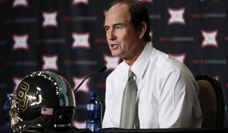 FILE - In this July 21, 2015, file photo, Baylor coach Art Briles addresses attendees at the NCAA college Big 12 Conference football media days in Dallas. Texas’ top law enforcement agency has opened a preliminary investigation into Baylor University and how it handled reports of sexual and physical assault over several years. The Texas Rangers confirmed Wednesday, March 1, 2017, they are working with the McLennan County prosecutor’s office to “determine if further action is warranted.” Baylor fired Briles in 2016 and demoted former President and Chancellor Ken Starr, who later resigned. Former athletic director Ian McCaw also resigned and is now at Liberty University in Virginia. (AP Photo/Tony Gutierrez, File)