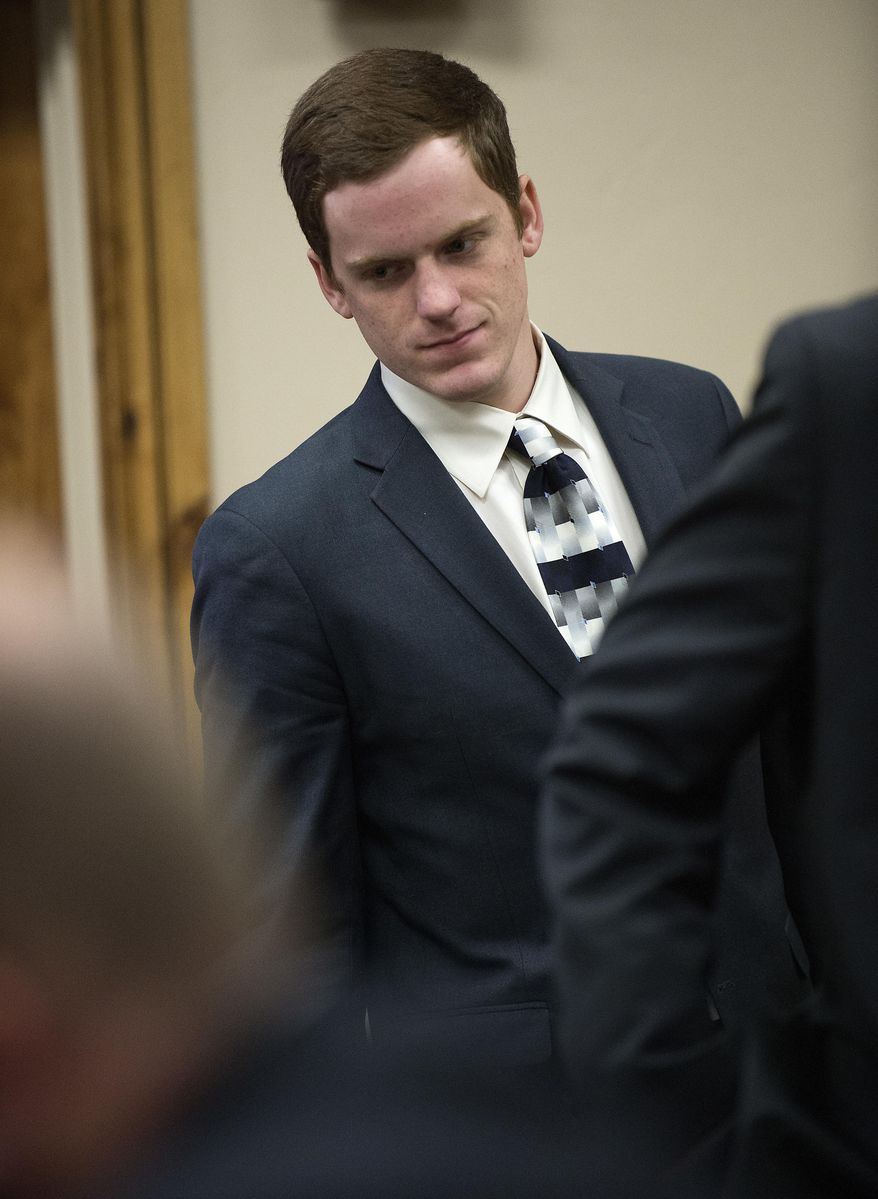 FILE - In this Feb. 24, 2017, file photo, John R.K. Howard takes a seat during his sentencing hearing at the courthouse in Twin Falls, Idaho. District Judge Randy Stoker has sentenced Howard, a high school football player, to three years of probation and 300 hours of community service after prosecutors said he took part in a brutal locker room assault on a black football player in a small Idaho town. (Drew Nash/The Times-News via AP, File)