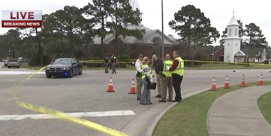 In this image made from a video provided by FOX10 News authorities respond to the scene after an SUV driven by a 73-year-old man accelerated and hit members of a high school band at the start of a Mardi Gras parade in Gulf Shores, Ala., Tuesday, Feb. 28, 2017. (Franz Barraza/FOX10 News via AP) MANDATORY CREDIT
