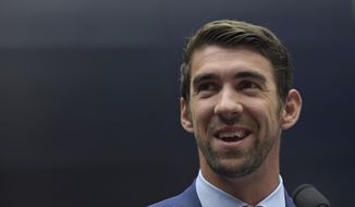 Olympic swimmer Michael Phelps testifies on Capitol Hill in Washington, Tuesday, Feb. 28, 2017, before the House Commerce Energy and Commerce subcommittee hearing on the international anti-doping system. (AP Photo/Susan Walsh) ** FILE **