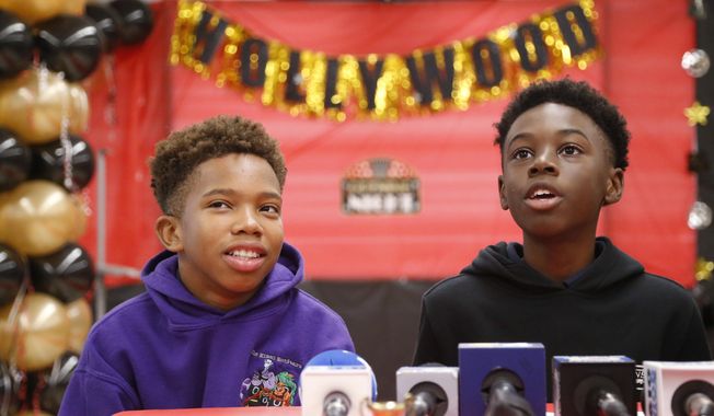 Jaden Piner, left, 13, and Alex Hibbert, 12, speak about what it was like to be at the Academy Awards for their part in the film &amp;quot;Moonlight,&amp;quot; during a news conference at Norland Middle School, Wednesday, March 1, 2017, in Miami Gardens, Fla.  The film garnered three Oscars Sunday night, including the award for best picture. (AP Photo/Wilfredo Lee)