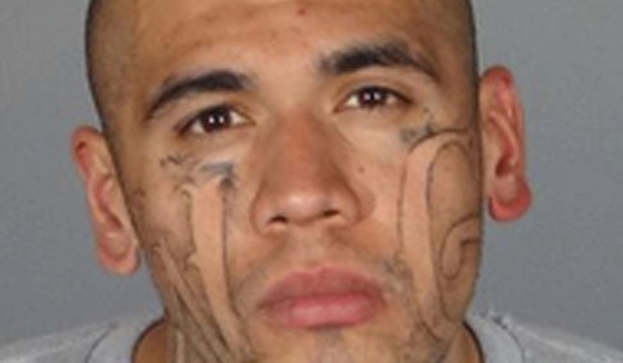FILE - This undated file photo provided by the Los Angeles County Sheriff's Department shows Michael Christopher Mejia. A recently paroled gang member, Mejia, has been charged with killing Whittier Police Officer Keith Boyer, wounding Boyer's partner. He was charged Wednesday, March 1, 2017 with murder with special circumstances, making him eligible for the death penalty. (Los Angeles County Sheriff's Department via AP, File)