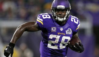 FILE - In this Sept. 18, 2016, file photo, Minnesota Vikings running back Adrian Peterson carries the ball during the first half of an NFL football game against the Green Bay Packers in Minneapolis. The Vikings on Tuesday, Feb. 28, 2017. have declined to exercise their option for next season on Peterson’s contract. This makes the franchise’s all-time leading rusher an unrestricted free agent when the market opens next week. (AP Photo/Andy Clayton-King, File)