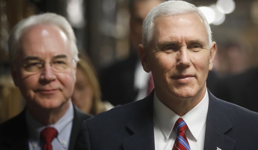 Vice President Mike Pence, accompanied by Health and Human Services Secretary Tom Price, left, tours the Frame USA facility, Thursday, March 2, 2017, in Springdale, Ohio. Pence visited Ohio to discuss healthcare and other issues while engaging in a "listening session" with small business owners. (AP Photo/John Minchillo)