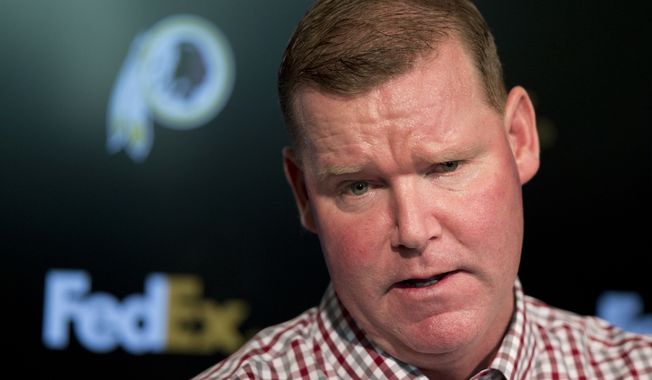 FILE - In this April 25, 2016, file photo, Washington Redskins&#x27; general manager Scot McCloughan speaks during a news conference at Redskins Park in Ashburn, Va. McCloughan is not attending the NFL combine in Indianapolis. Team spokesman Tony Wyllie confirmed McCloughan&#x27;s absence in an email to The Associated Press Thursday, March 2, 2017, saying McCloughan &quot;is taking care of some family matters.&quot; (AP Photo/Manuel Balce Ceneta, File)