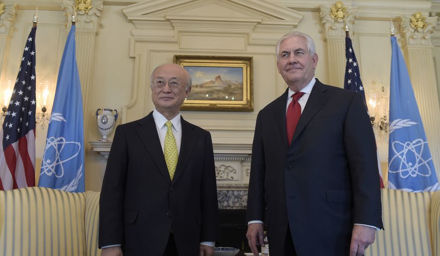 Secretary of State Rex Tillerson stands with International Atomic Energy Agency Director General Yukiya Amano, at the State Department in Washington, Thursday, March 2, 2017, (AP Photo/Susan Walsh)