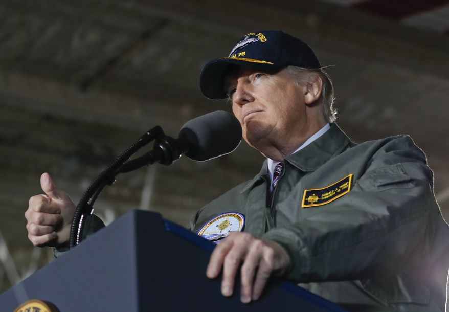 President Donald Trump gives a thumbs up while speaking to Navy and shipyard personnel aboard nuclear aircraft carrier Gerald R. Ford, Thursday, March 2, 2017, at Newport News Shipbuilding in Newport News, Va. The ship which is still under construction is due to be delivered to the Navy later this year. (AP Photo/Pablo Martinez Monsivais)