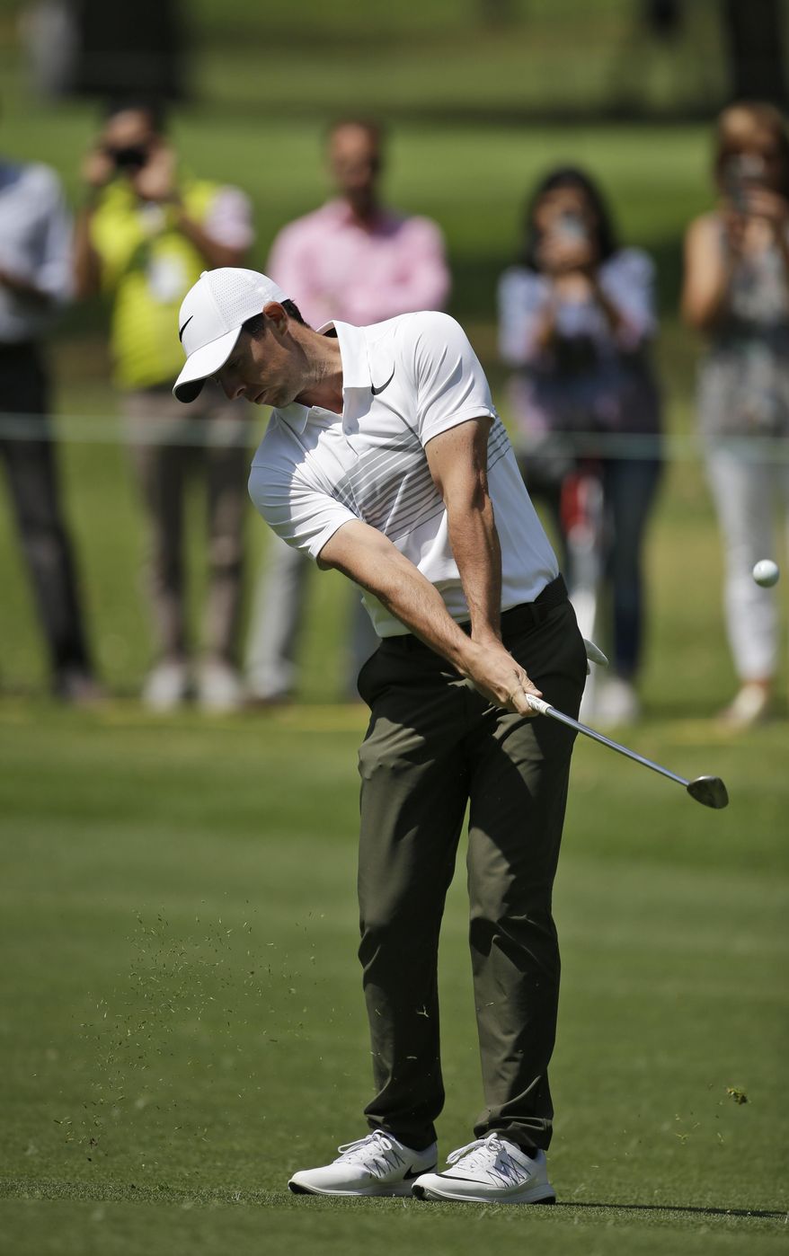 Rory McIlroy of Northern Ireland plays on the 11th hole, in round one of the Mexico Championship at Chapultepec Golf Club in Mexico City, Thursday, March 2, 2017. All but one of the world's top 50 golfers are contesting the World Golf Championship PGA event, which this year relocated to Mexico City from the Trump National Doral Resort in Florida. (AP Photo/Rebecca Blackwell)