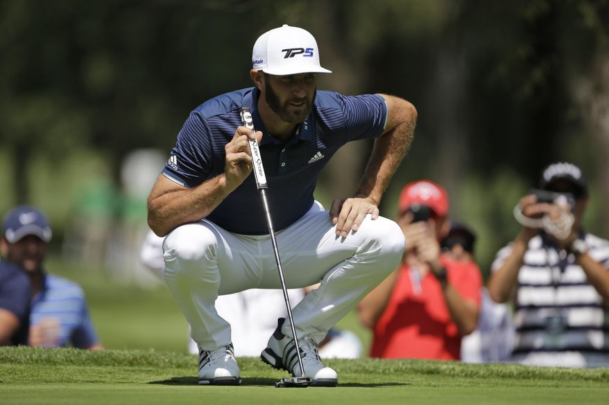 Dustin Johnson of the U.S. prepares to putt on the 11th hole, in round one of the Mexico Championship at Chapultepec Golf Club in Mexico City, Thursday, March 2, 2017. All but one of the world's top 50 golfers are contesting the World Golf Championship PGA event, which this year relocated to Mexico City from the Trump National Doral Resort in Florida. (AP Photo/Rebecca Blackwell)