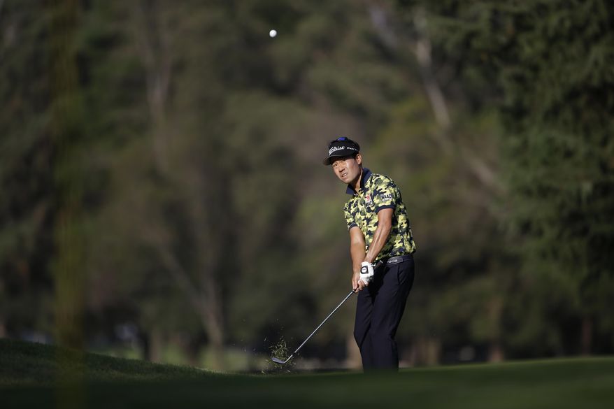 Kevin Na, of the U.S., chips the ball on the 9th hole in round one of the Mexico Championship at Chapultepec Golf Club in Mexico City, Thursday, March 2, 2017. All but one of the world's top 50 golfers are contesting the World Golf Championship PGA event, which this year relocated to Mexico City from the Trump National Doral Resort in Florida. (AP Photo/Rebecca Blackwell)