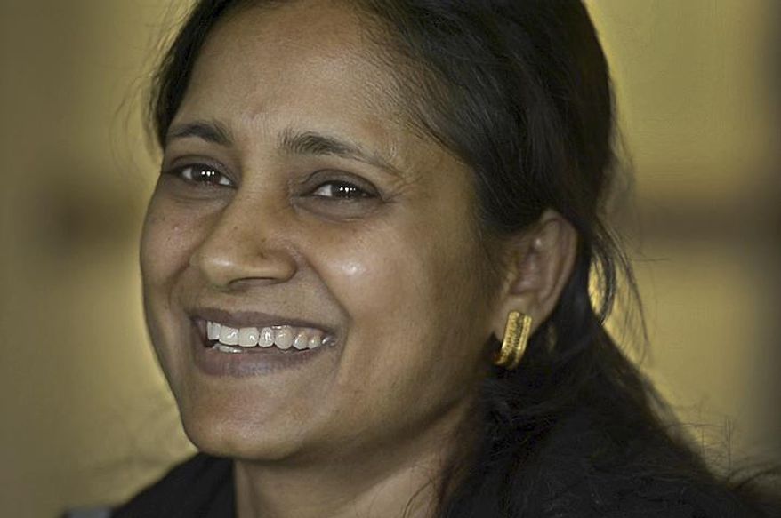 ADVANCE FOR THE WEEKEND OF MARCH 4-5 AND THEREAFTER - In a Feb. 21, 2017 photo, Sarita Sah, who arrived in Utah from India three weeks ago, has been getting to know her grandson for the first time. Sarita and her husband Ken, are now reunited with their son, Kunal, who has been running the family's hotel business in Green River since 2011, trying to keep his parents' dream alive without them. Ken and Sarita Sah, were forced to leave the country in 2006 after losing their legal battle with U.S. Immigration authorities.  (Leah Hogsten/The Salt Lake Tribune via AP)