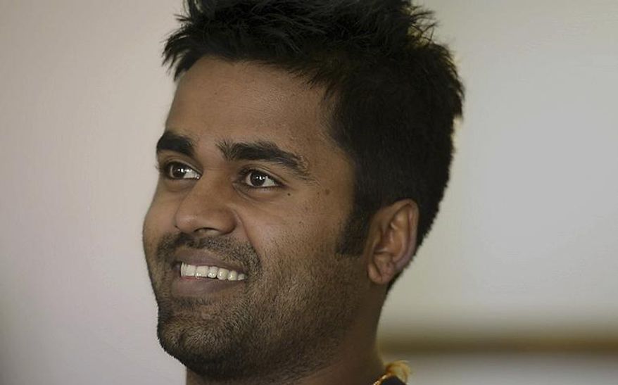 ADVANCE FOR THE WEEKEND OF MARCH 4-5 AND THEREAFTER - , "More than half my life's been consumed with this immigration case so it's just a huge weight off my shoulders," said Kunal Sah of welcoming his mother and father back to the U.S. for the first time in over 10 years. Kunal's parents, Ken and Sarita, were forced to leave the country in 2006 after losing their legal battle with U.S. Immigration authorities. Kunal has been running the family's hotel business in Green River since 2011, trying to keep his parents' dream alive without them. (Leah Hogsten/The Salt Lake Tribune via AP)