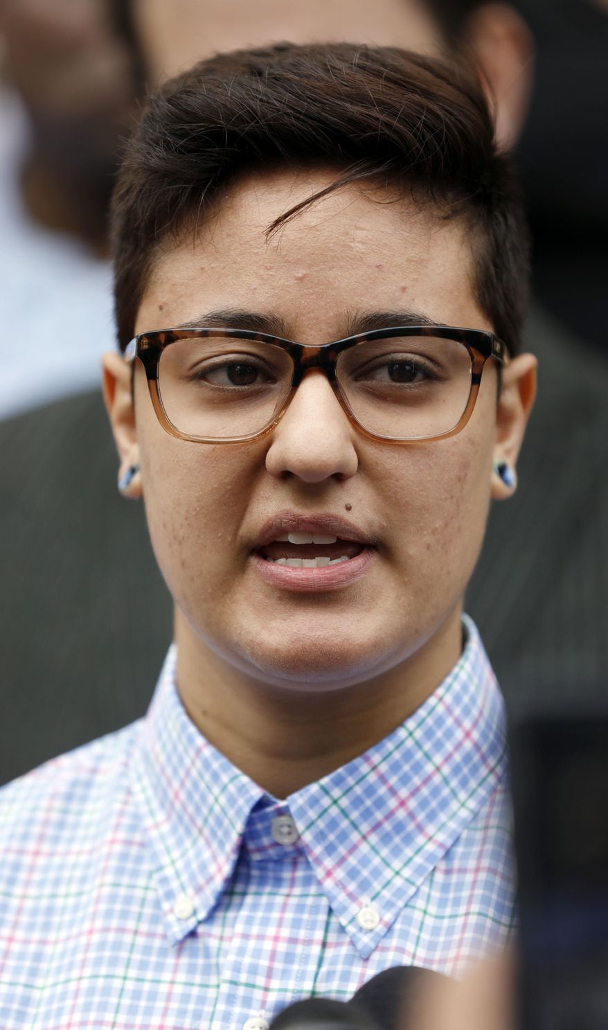 Daniela Vargas speaks about the recent immigration raid that picked up more than 50 allegedly undocumented immigrants including her father and brother during a news conference Wednesday, March 1, 2017, at the Jackson, Miss., city hall. A shot time after the news conference, Vargas was detained by ICE officials. A college student, Vargas hopes to continue her education but fears for the fate of other undocumented immigrant families. (AP Photo/Rogelio V. Solis)