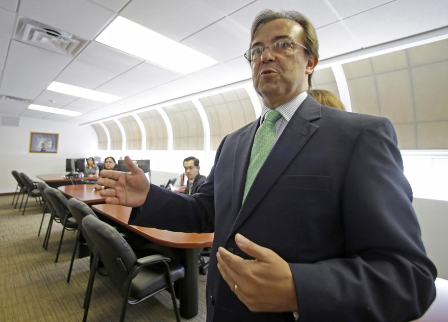 Mexican Consul General Jose Antonio Zabalgoitia talks to reporters as he shows the new offices of the legal Defense Center at the Mexican Consulate General, Friday, March 3, 2017, in Miami. The Mexican government is beefing up its aid to migrants in the U.S. through the creation of 50 legal assistance centers in response to President Donald Trump's measures to curb illegal immigration. (AP Photo/Alan Diaz)
