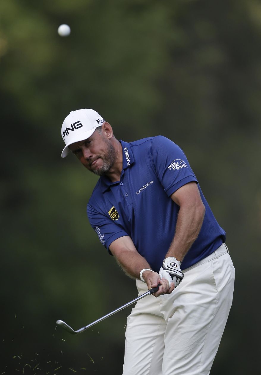 England's Lee Westwood chips the ball on the 9th hole in round one of the Mexico Championship at Chapultepec Golf Club in Mexico City, Thursday, March 2, 2017. All but one of the world's top 50 golfers are contesting the World Golf Championship PGA event, which this year relocated to Mexico City from the Trump National Doral Resort in Florida. (AP Photo/Rebecca Blackwell)