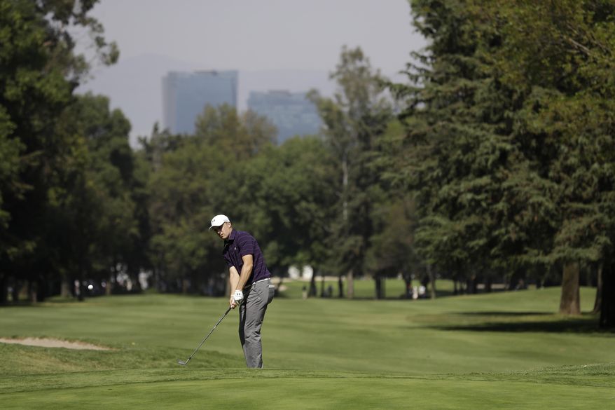 Jordan Spieth, of the U.S., prepares to play on the 8th hole, in round one of the Mexico Championship at Chapultepec Golf Club in Mexico City, Thursday, March 2, 2017. All but one of the world's top 50 golfers are contesting the World Golf Championship PGA event, which this year relocated to Mexico City from the Trump National Doral Resort in Florida. (AP Photo/Rebecca Blackwell)