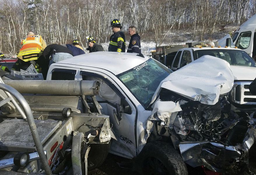 Firefighters work to remove victims from wrecked vehicles on Interstate 81 Friday, March 3, 2017. Several Pennsylvania interstates are closed and numerous injuries have been reported as police respond to weather-related crashes and pileups. The Pennsylvania Department of Transportation says snow squalls moving across the state led to several multi-vehicle wrecks Friday. A pileup on Interstate 81 in Schuylkill County has sent multiple people to the hospital. (Frank Andruscavage/Republican-Herald via AP)