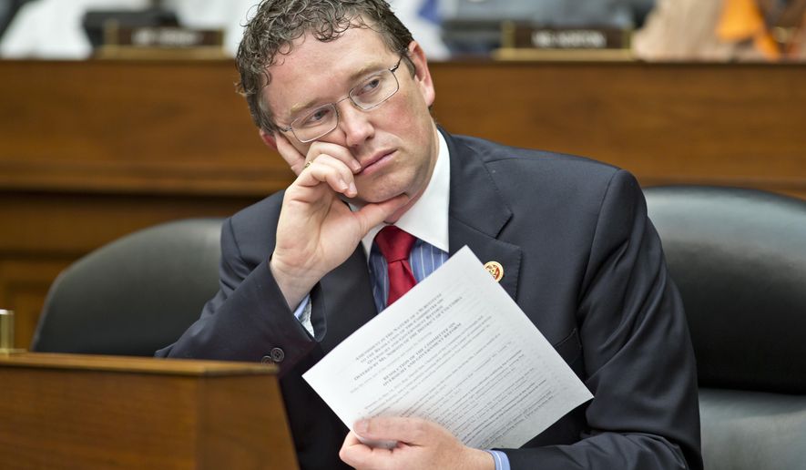 In this June 28, 2013 file photo, Rep. Thomas Massie, R-Ky., listens during a hearing on Capitol Hill in Washington. The Capitol is suddenly awash with trouble-makers and rebels, and that’s just the Republicans. Whatever GOP unity was produced by Donald Trump’s victory in November has all but disappeared, and Republican leaders are confronting open rebellion in their ranks as they try to finalize health care legislation.  (AP Photo/J. Scott Applewhite, File)