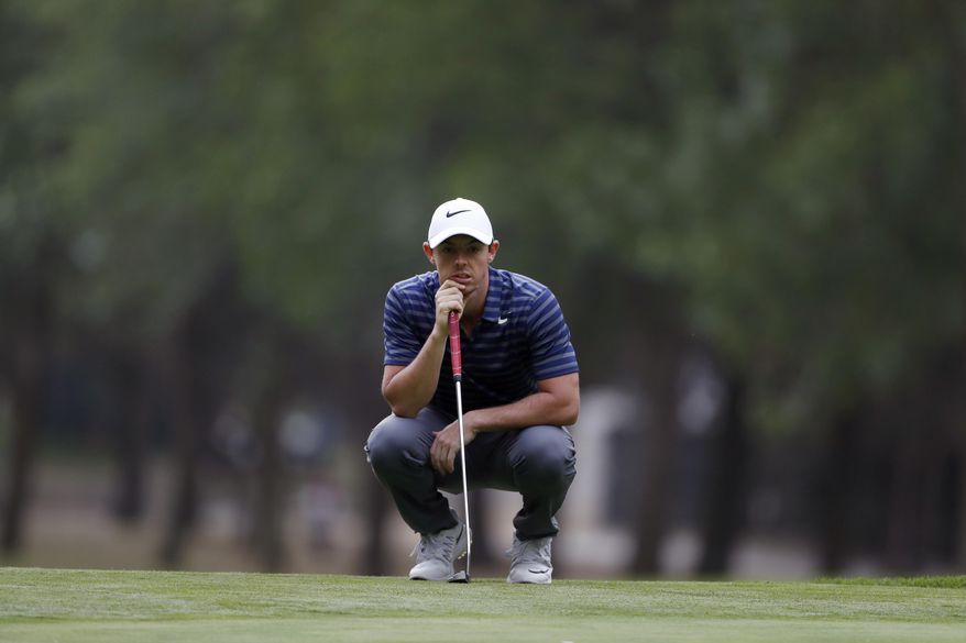 Rory McIlroy, of Northern Ireland, prepares to putt on the 17th hole green in round two of the Mexico Championship at Chapultepec Golf Club in Mexico City, Friday, March 3, 2017. All but one of the world's top 50 golfers are contesting the World Golf Championship PGA event, which this year relocated to Mexico City from the Trump National Doral Resort in Florida. (AP Photo/Eduardo Verdugo)