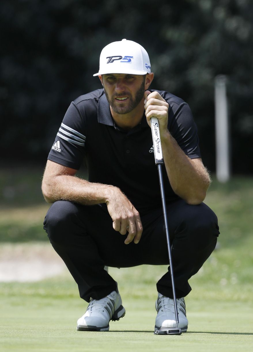 Dustin Johnson of the U.S. prepares to putt on the 1st hole in round three of the Mexico Championship at Chapultepec Golf Club in Mexico City, Saturday, March 4, 2017. All but one of the world's top 50 golfers are contesting the World Golf Championship PGA event, which this year relocated to Mexico City from the Trump National Doral Resort in Florida. (AP Photo/Eduardo Verdugo)